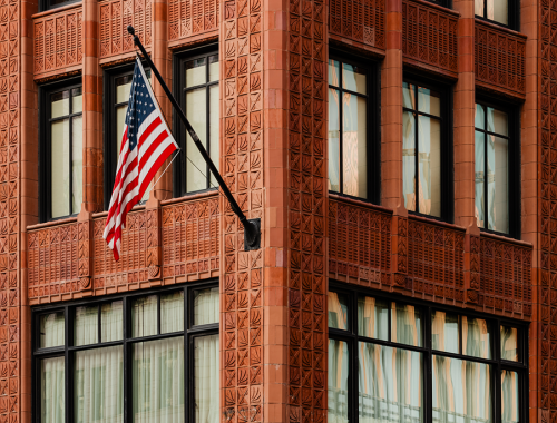 Shinola Hotel exterior with flag and clock