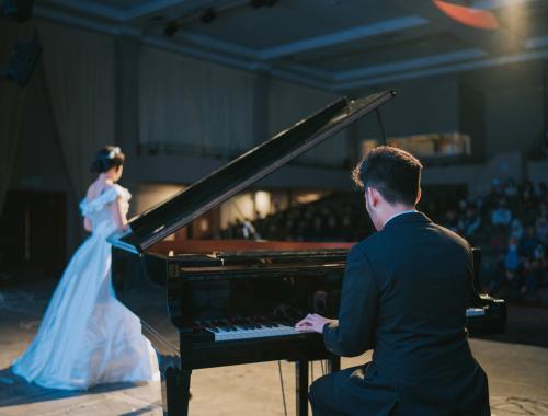 pianist and opera singer on stage