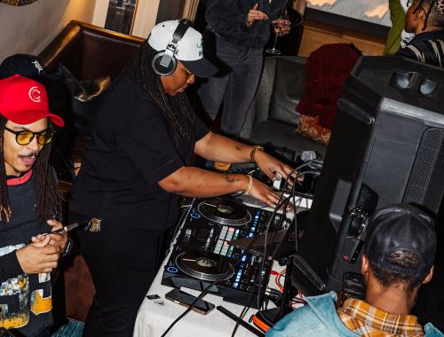 DJ surrounded by a crowd