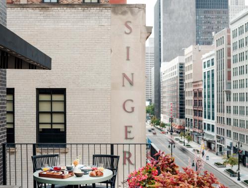 Terrace table with in-room dining selection and a view of Detroit's downtown core