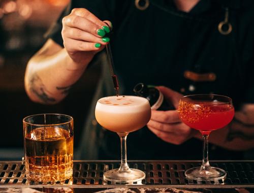 Bartender making a drink at the Evening Bar