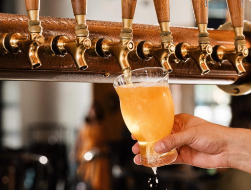 The Brakeman Bartender pouring a drink 