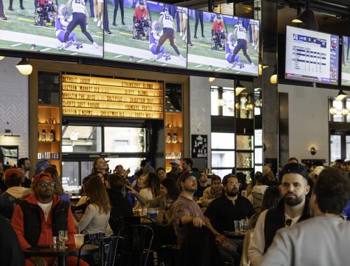A crowd of Lions fans inside The Brakeman