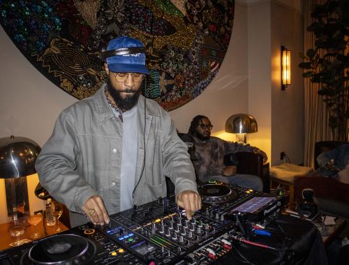 Donovan Glover spins in the Living Room