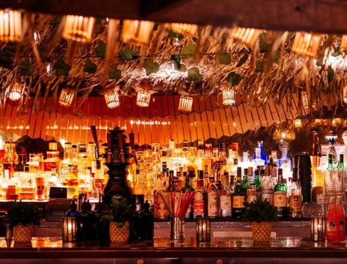 Evening bar decked out in tiki decorations