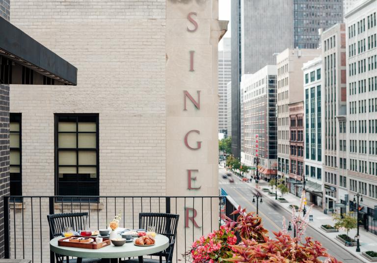 A relaxing breakfast on a balcony at Shinola Hotel