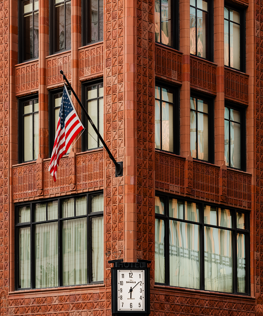 Shinola Hotel exterior with flag and clock
