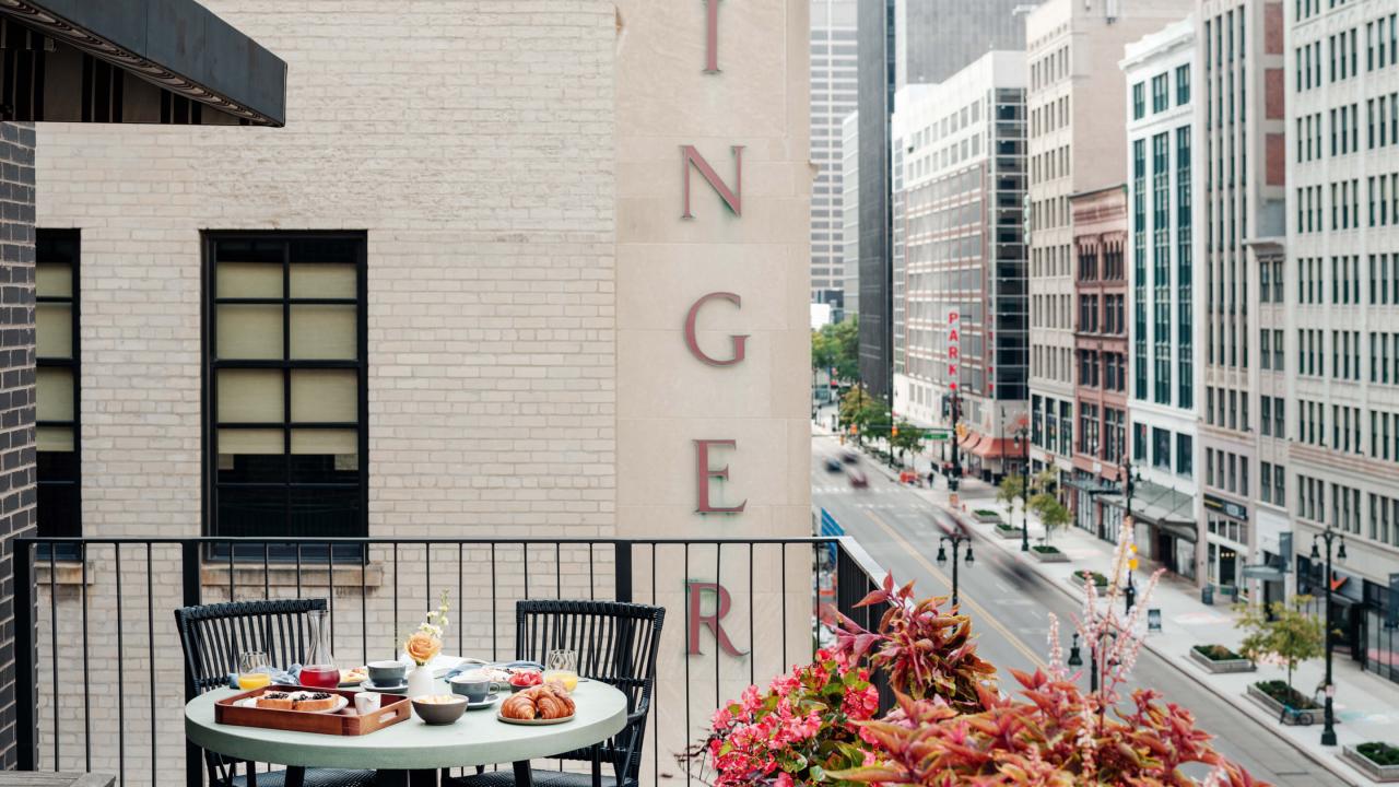 Terrace table with in-room dining selection and a view of Detroit's downtown core