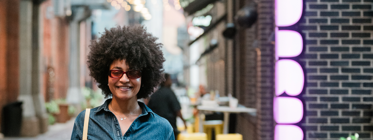 Woman walking down Parker’s Alley in Detroit