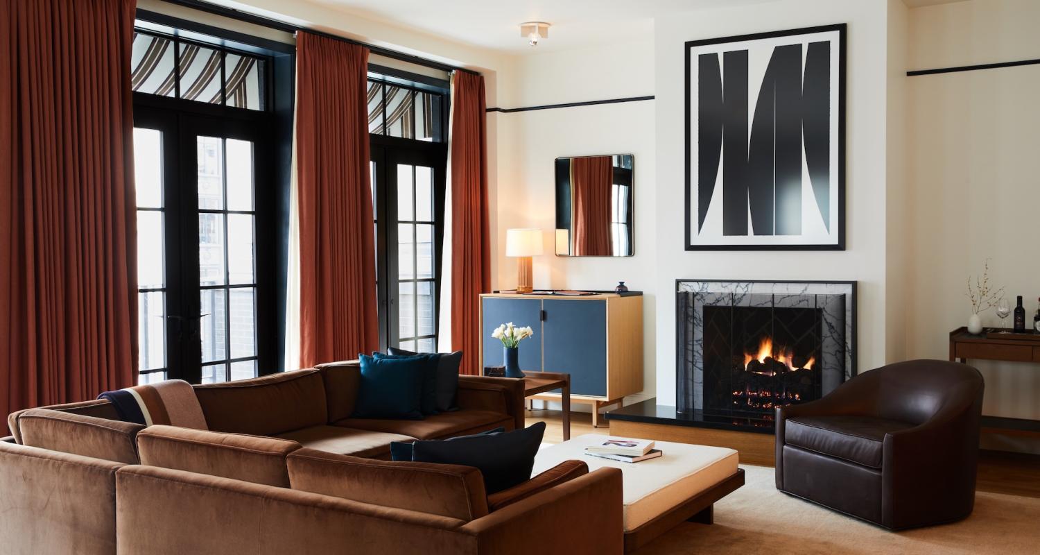 Bedrock Penthouse Couch and Fireplace