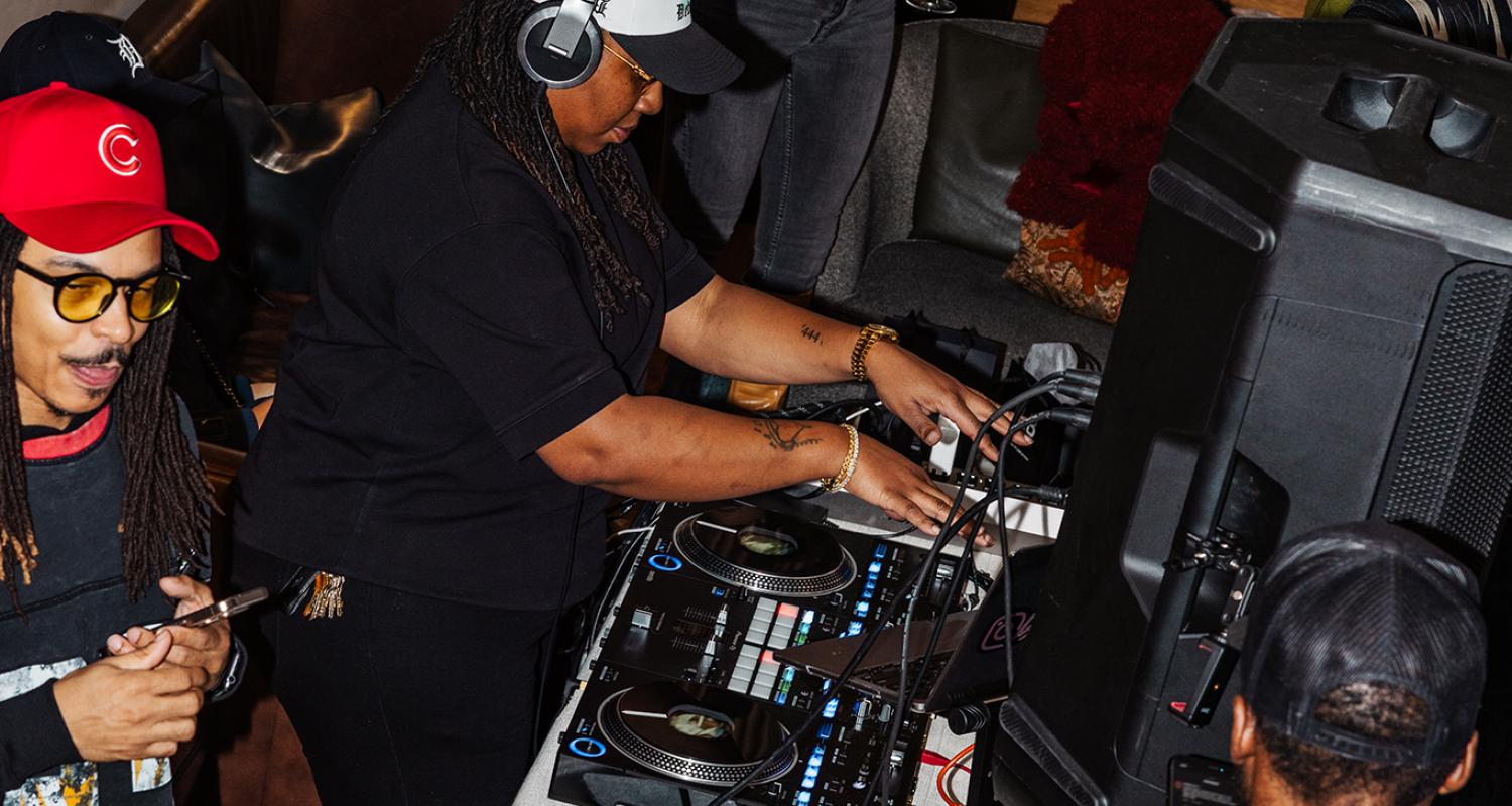 DJ surrounded by a crowd