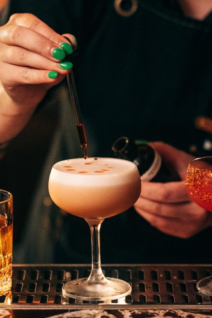Bartender making a drink at the Evening Bar