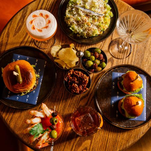 A spread of cocktails and bites at Evening Bar