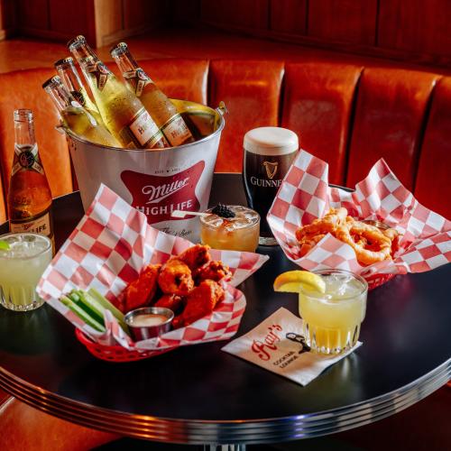 A spread of food and cocktails at Ray's in Detroit