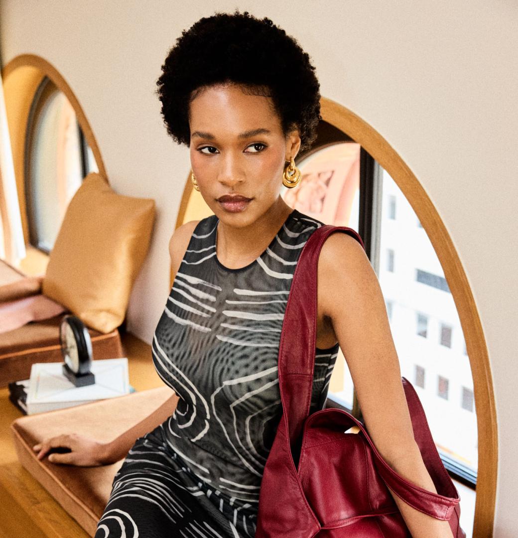 A model poses in pieces from Coup D'etat.