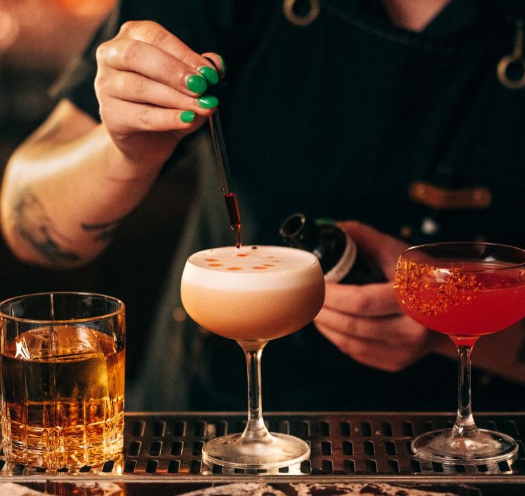 Bartender making a drink at the Evening Bar