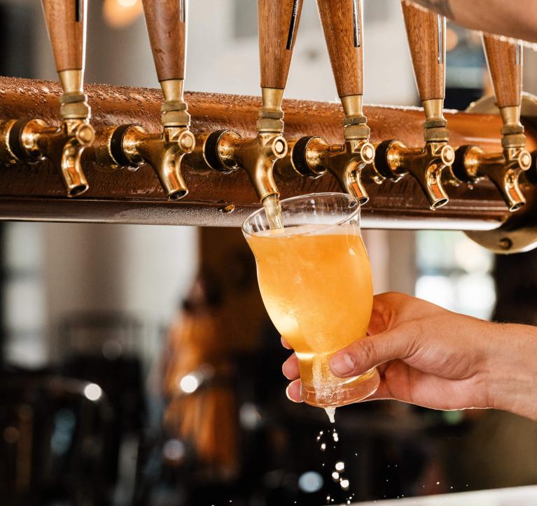 The Brakeman Bartender pouring a drink 