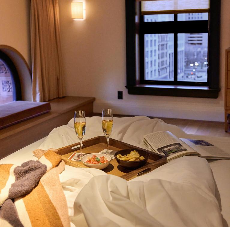 Champagne in bed in the Attic Suite