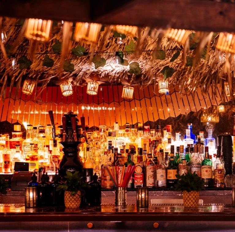 Evening bar decked out in tiki decorations