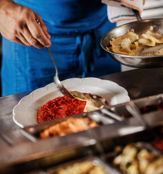 Chef plating pasta